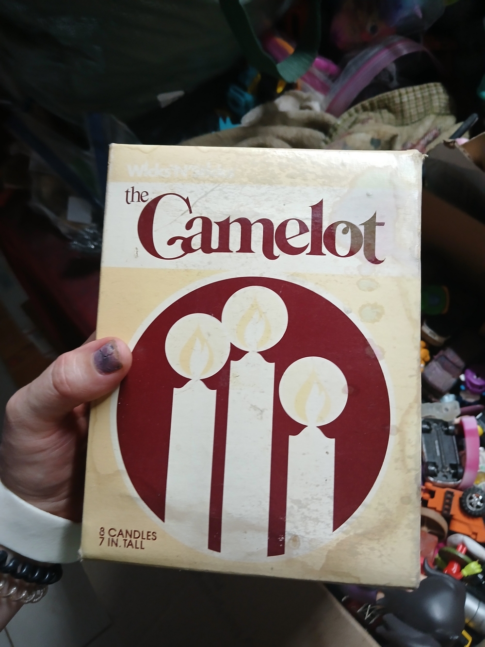 vintage box of "The Camelot" 7-inch tall candles, which contained 8 taper